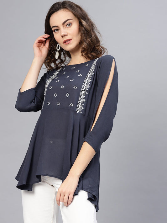Embroidered Peplum Top